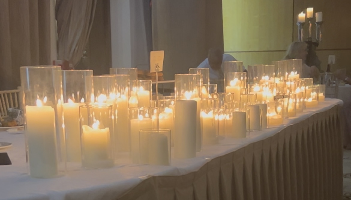 Evening top table wedding setup with elegant lighting